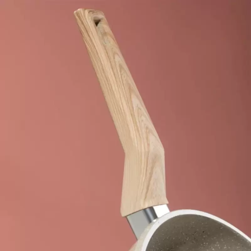 Sartén Oster 5.5L Beige, antiadherente y versátil para cocinar.