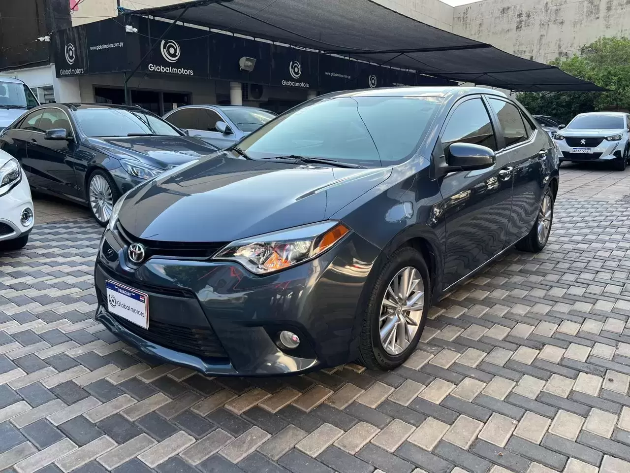 Toyota Corolla LE Americano 2014 en Globalmotors: Eficiente y confiable sedán compacto.